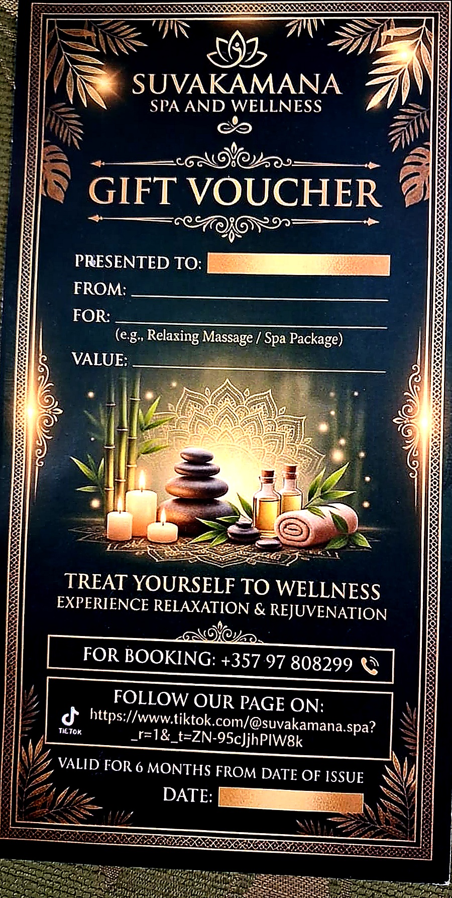 Suvakamana Spa & Wellness gift voucher in dark green and gold with lotus emblem